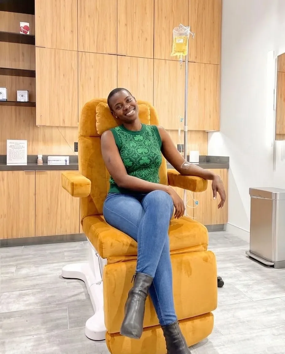 A guest sitting comfortably in a bright wellness lounge